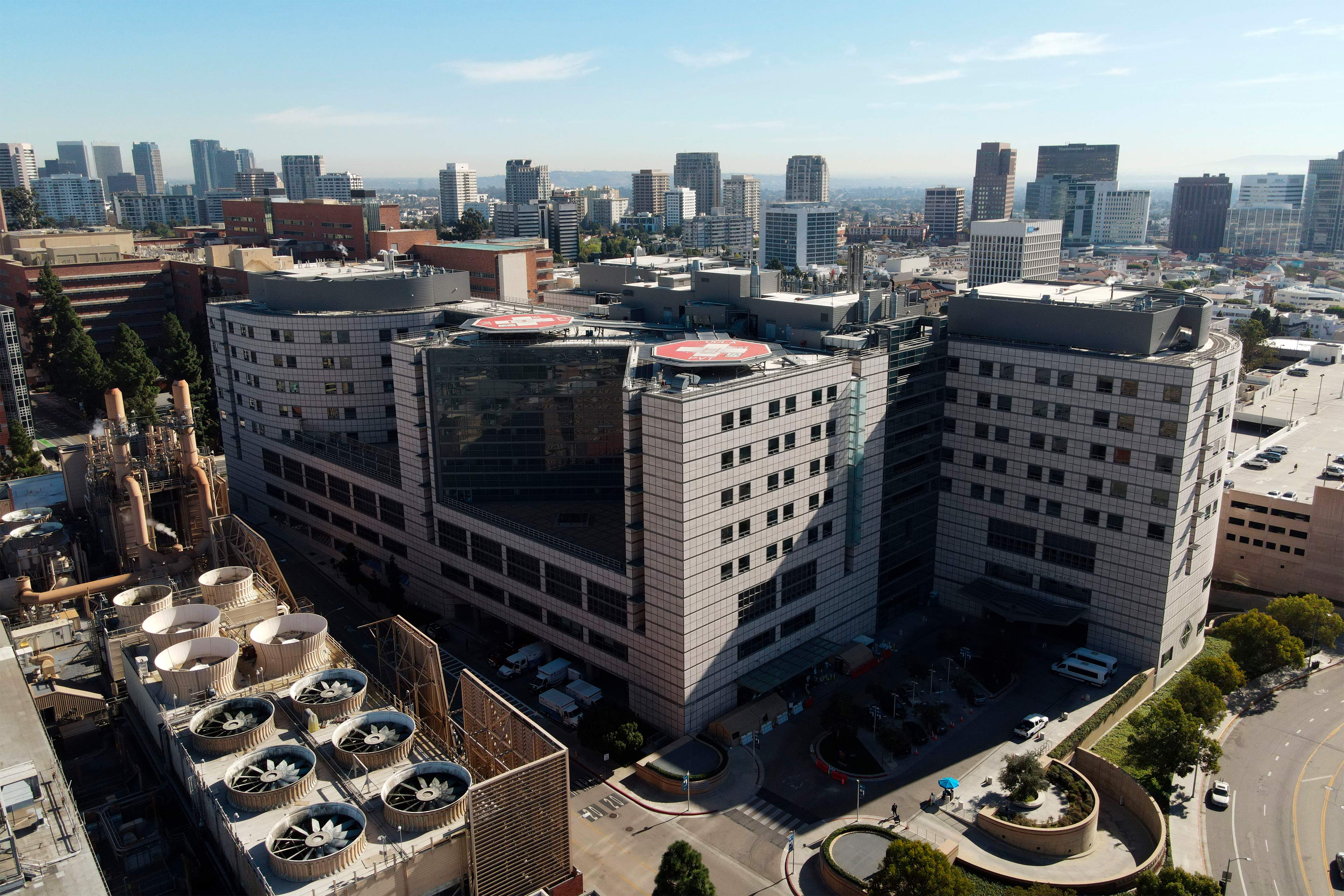 A photo shows an aerial view of a hospital, with landing pads for air ambulances.